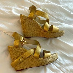 Michael Kors gold wedges